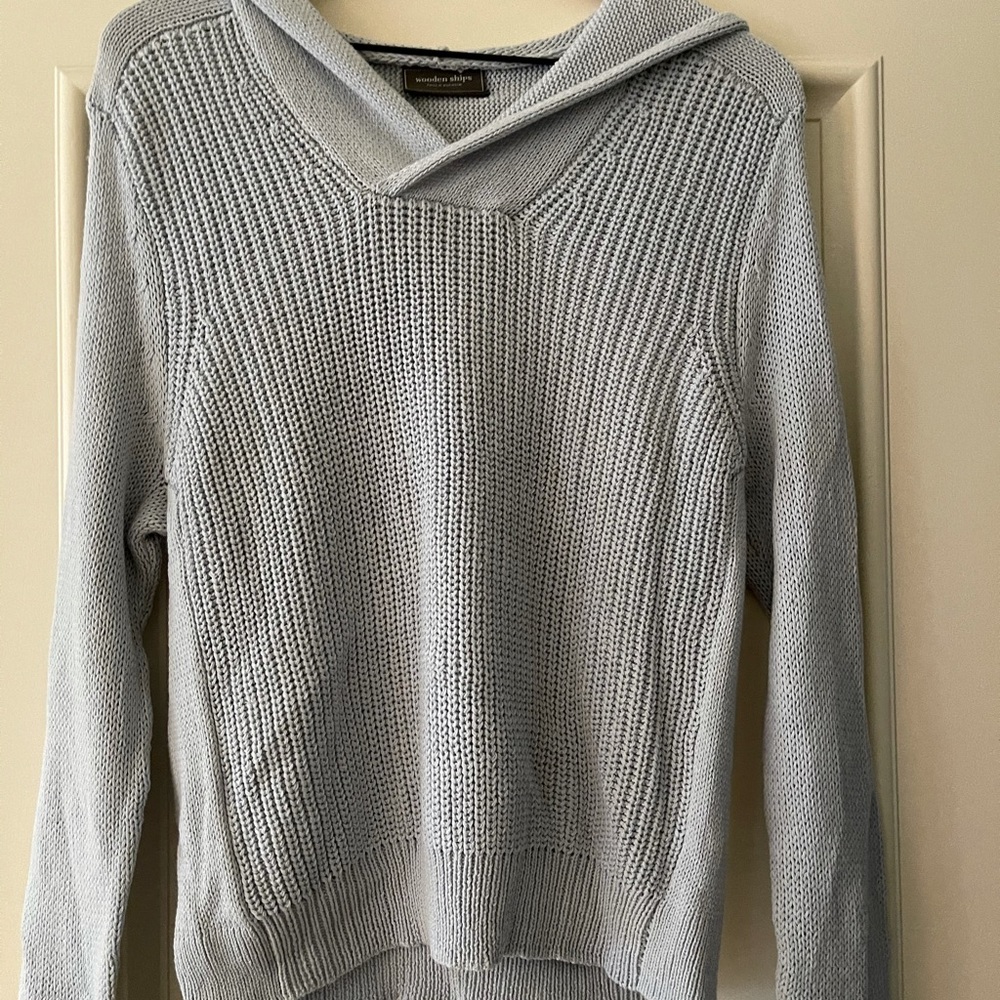 light blue sweater